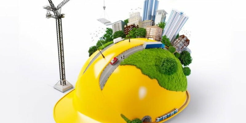 An illustration of a construction hat with a green city on it